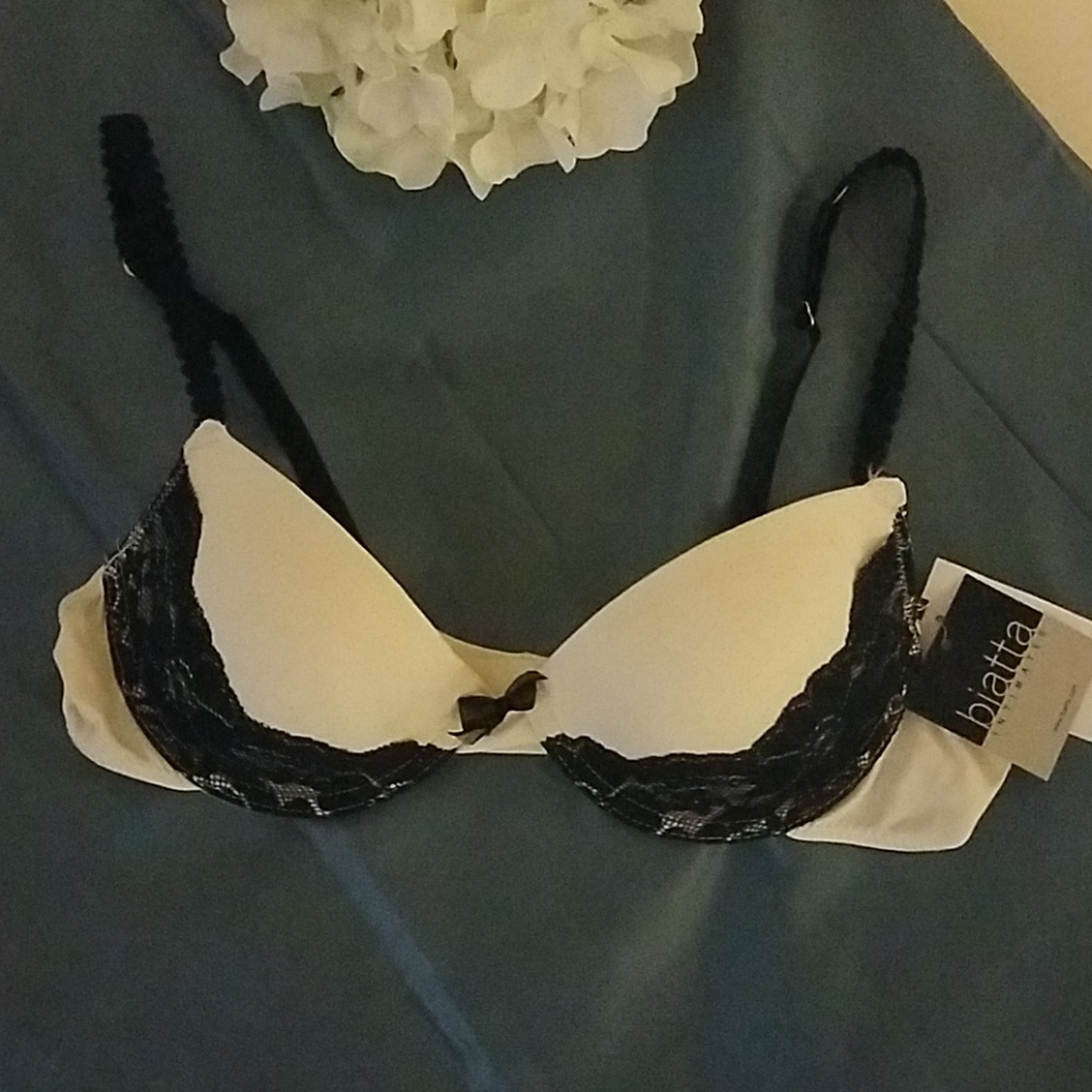 Beautiful Ivory colored bra with black lace trim